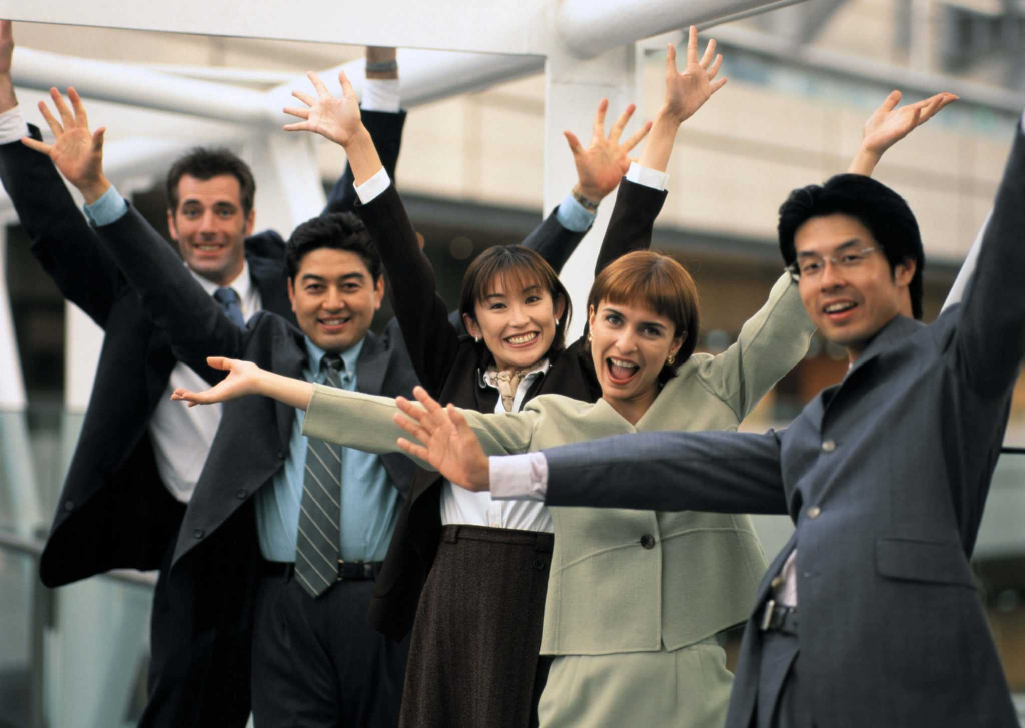 Business English Course - 5 business people holding up their arms