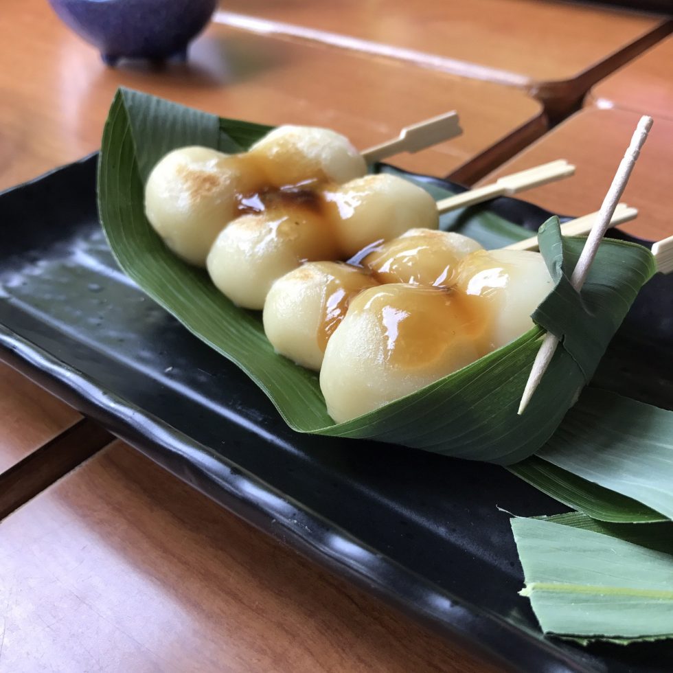 Tofu and mochi rice dumplings with a sweet soy sauce