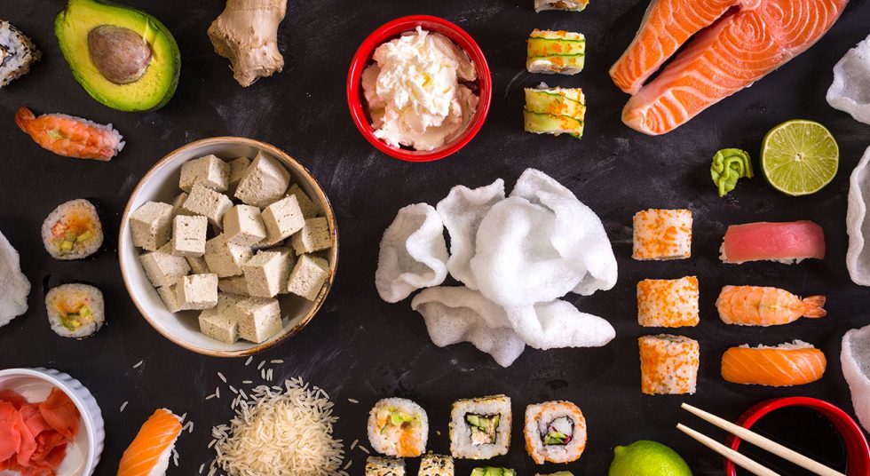 Sushi tofu prawn crackers lime salmon avocado ginger rice chopsticks bowl